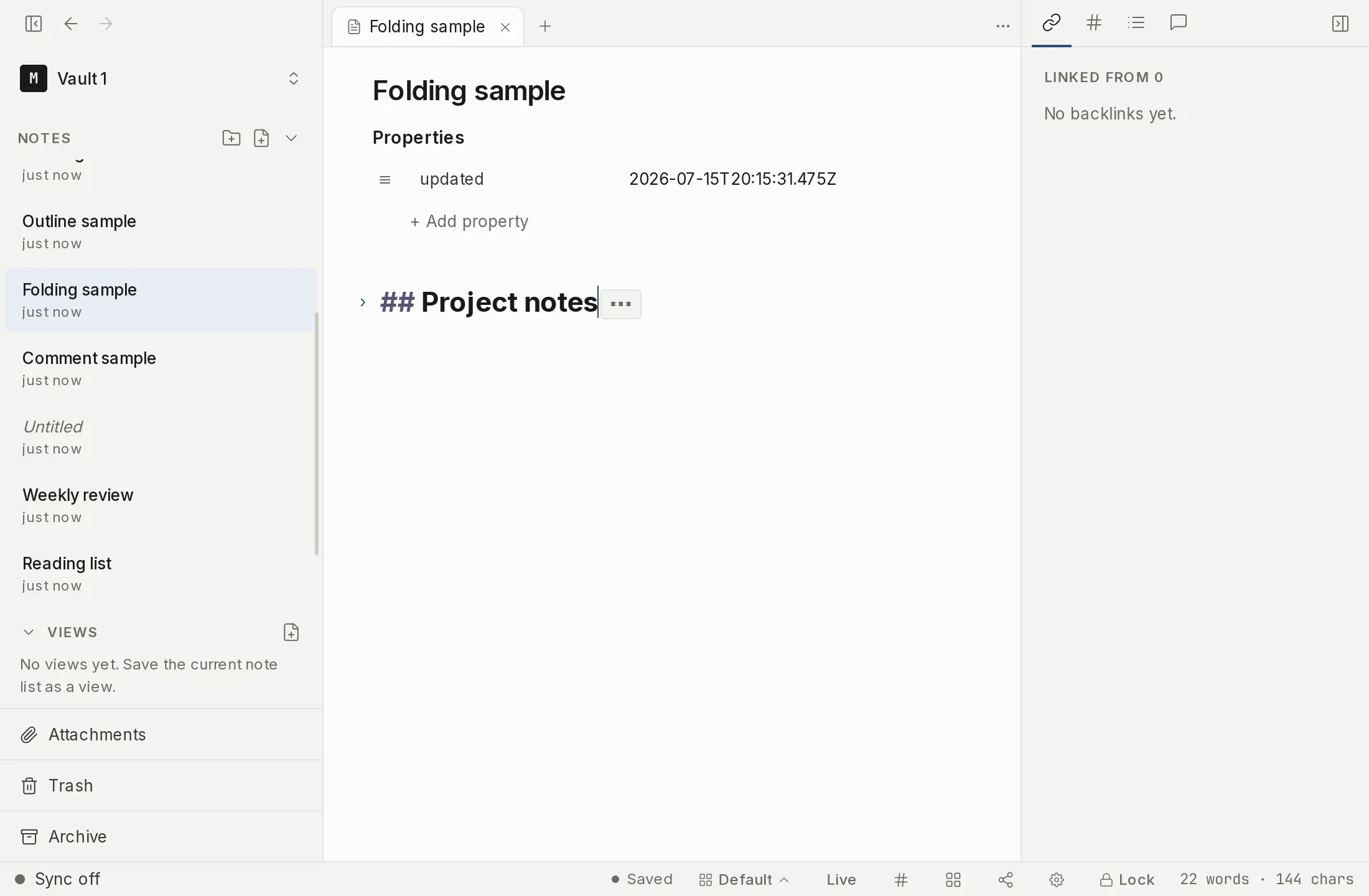 A note with a heading section folded, showing the collapsed placeholder where the hidden lines were.